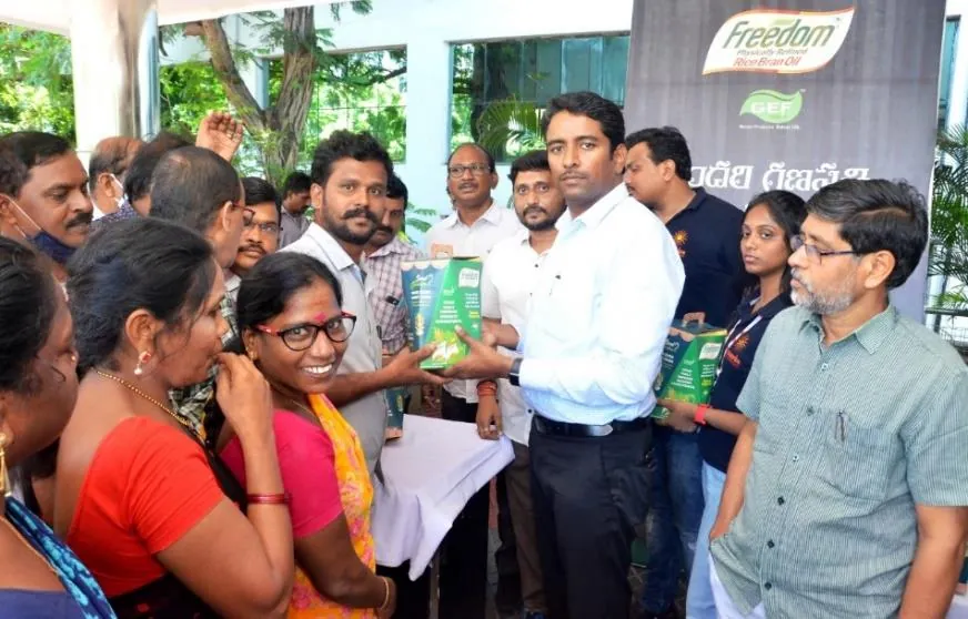 Seed Ganesha kit being handed to a resident at a community event